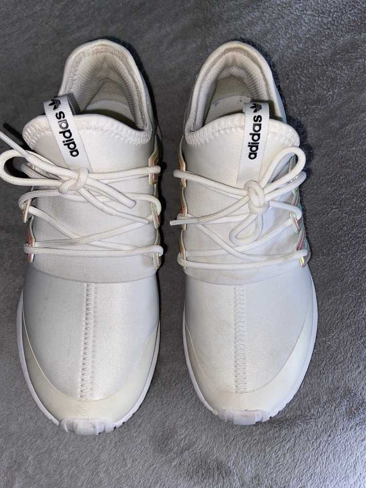 white and iridescent adidas tubular