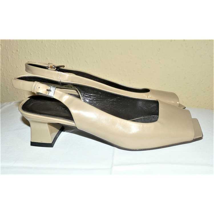 Pollini Pumps/Peeptoes Patent leather in Beige - image 2