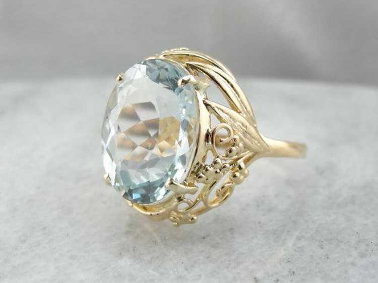 Filigree Surrounds a Lovely Natural Blue Topaz - image 1