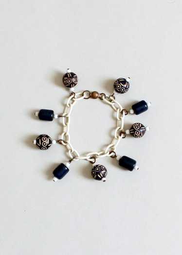 Vintage 1930s Navy Carved Beads on a Celluloid Ch… - image 1